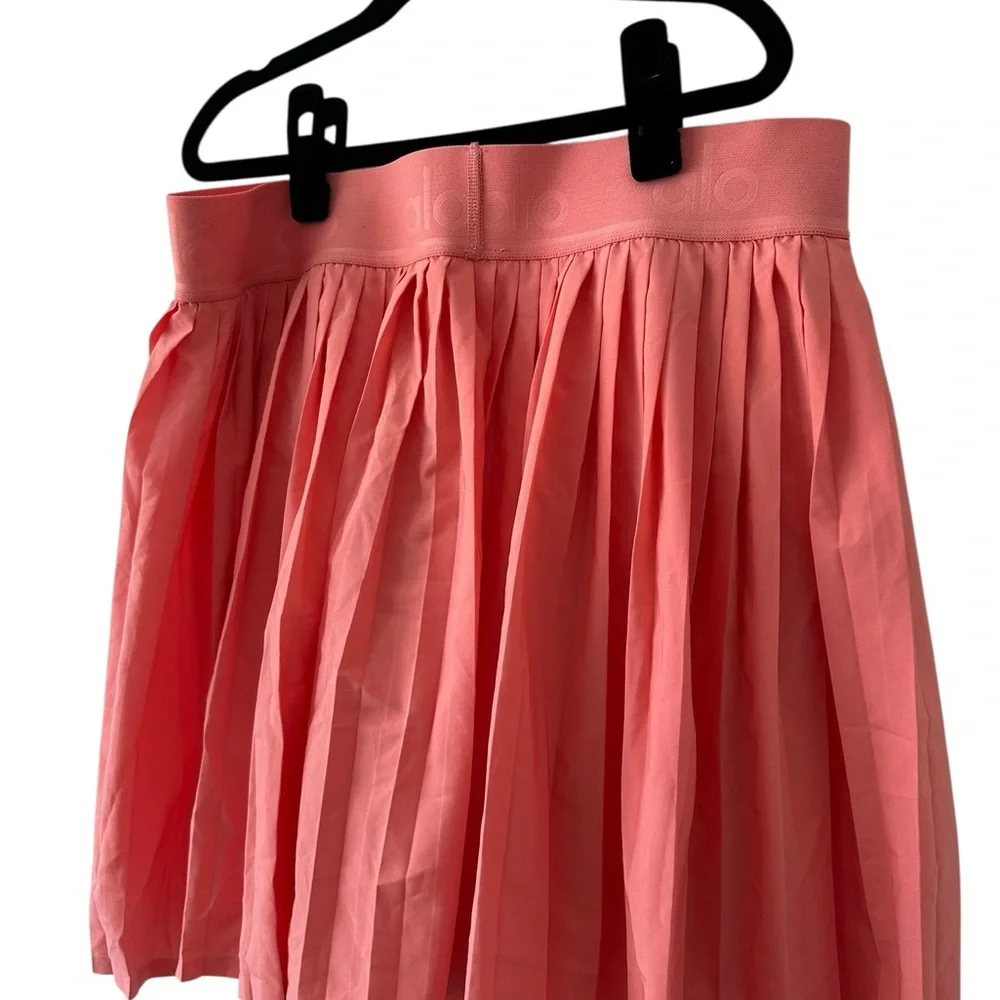 ALO Yoga Pleated Mini Skort in Coral Pink